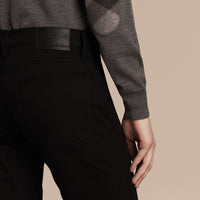 Jean délavé de coupe droite en denim extensible - Black