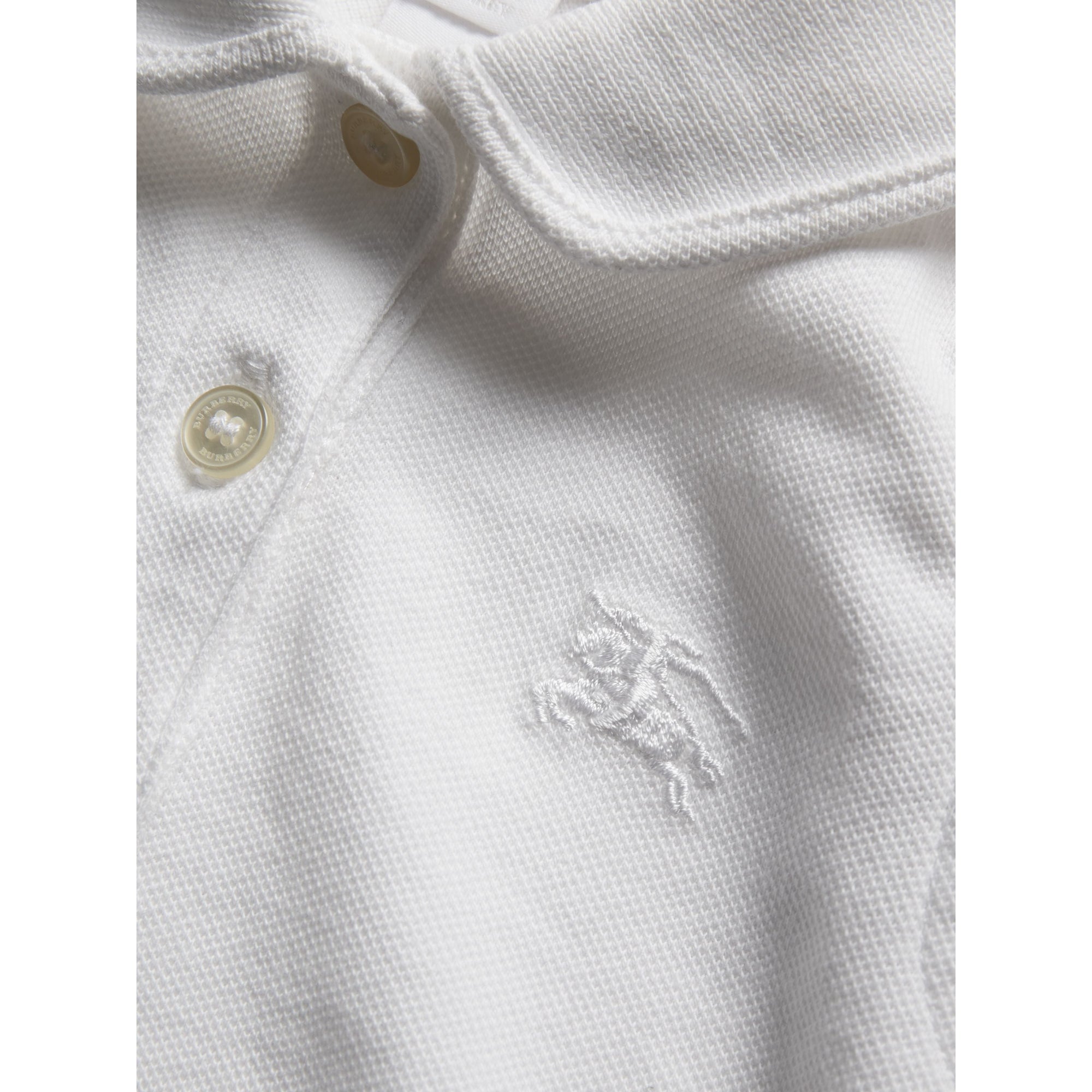Polo en piqué de coton à manches papillon - White