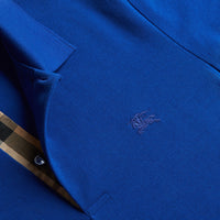 Polo en piqué de coton avec patte à motif check - Brilliant Blue