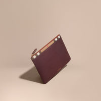 Pochette zippée en cuir grainé et tissu House check - Wine