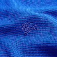 Polo à manches longues avec patte à motif check - Brilliant Blue