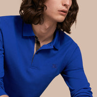 Polo à manches longues avec patte à motif check - Brilliant Blue