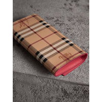 Portefeuille continental à motif Haymarket check avec cuir - Plum Pink