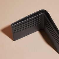 Portefeuille à rabat multidevise en cuir clouté - Black