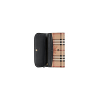 Portefeuille continental fin en cuir à motif Haymarket check - Black