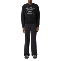 Pull en laine mérinos mélangée avec slogan - Black