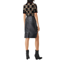Polo en jacquard de laine mérinos mélangée à damier - Black & Archve Beige